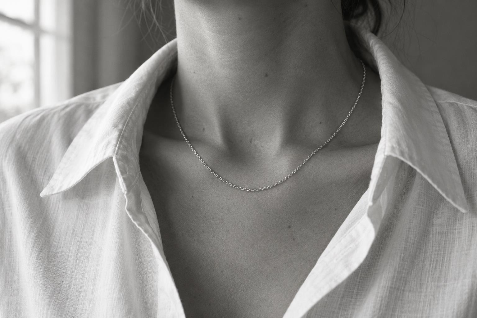 Black and white necklace styling editorial